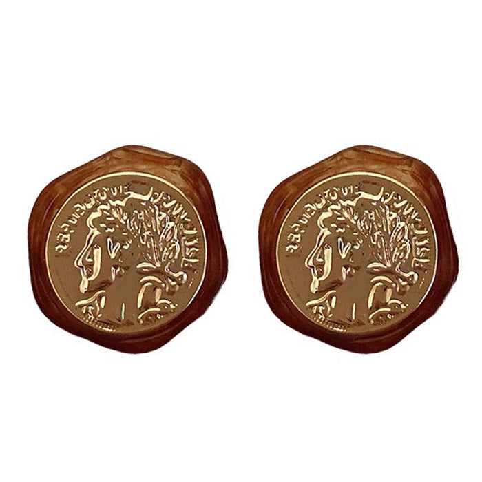 Pendientes de monedas con estética vintage