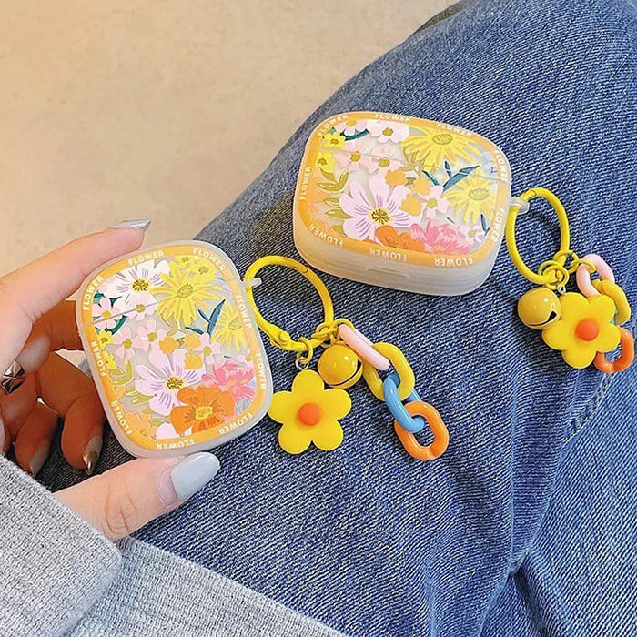 Estuche para AirPods con flores amarillas en flor