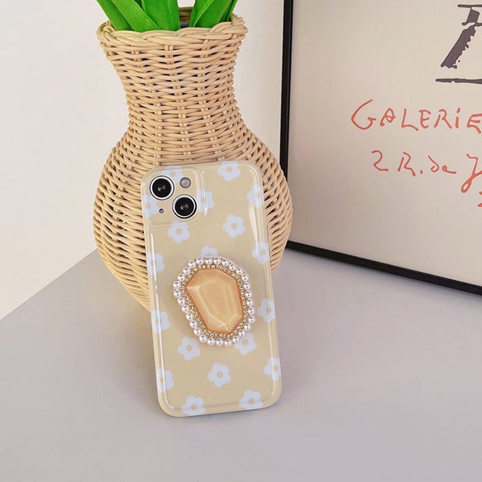 Funda para iPhone con margaritas amarillas