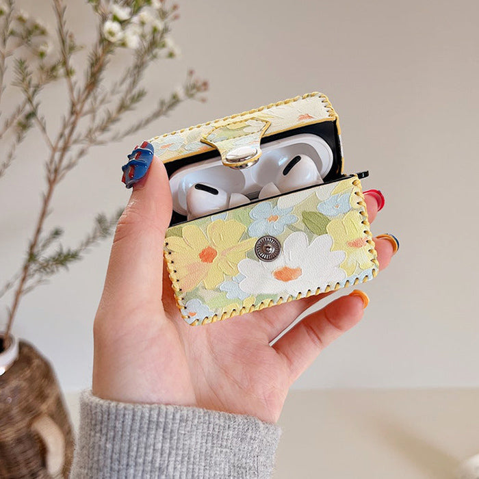 Estuche para Airpods con estampado floral amarillo