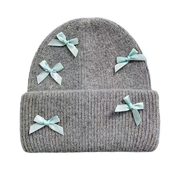 Gorro de lana con lazos suaves para niña