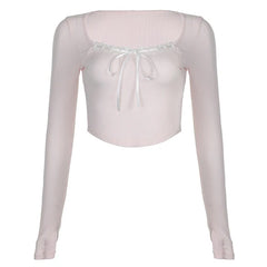 Top rosa con lazo para bebé Coquette