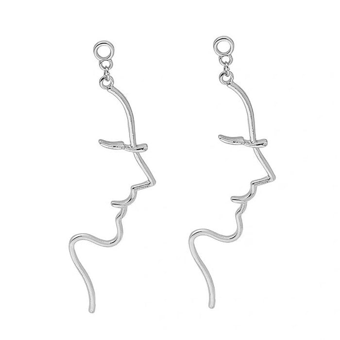 Pendientes minimalistas con contorno de rostro