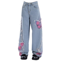 Rosa Jeans mit weitem Bein und Schmetterlingsmotiv