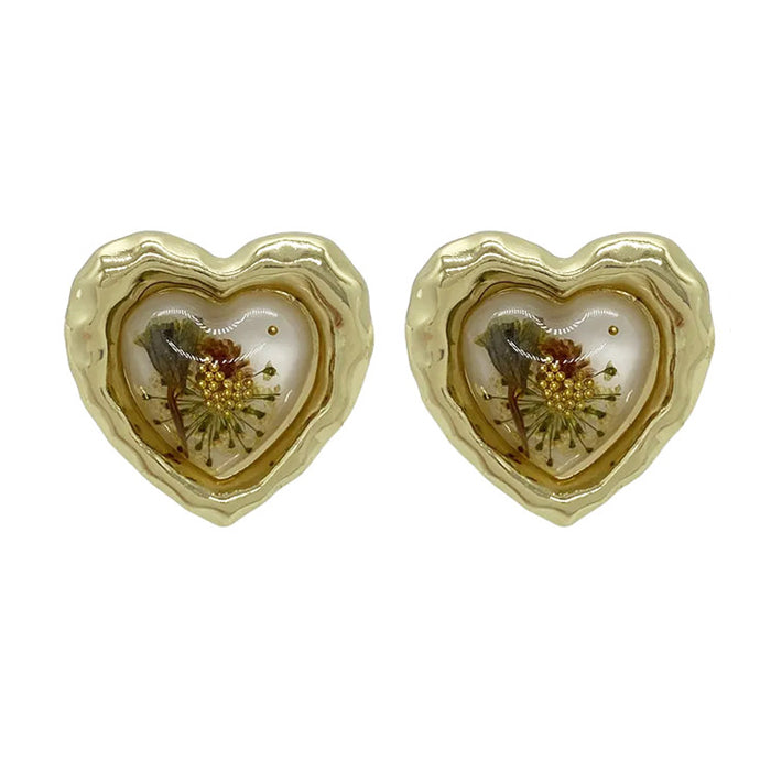 Pendientes de corazón vintage con flores prensadas