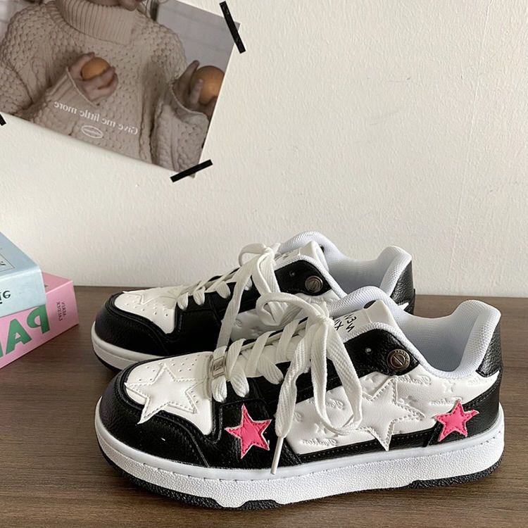 Zapatillas deportivas con estrellas en color rosa chicle y negro