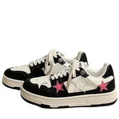 Zapatillas deportivas con estrellas en color rosa chicle y negro