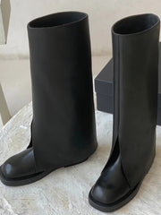 Botas altas hasta la rodilla negras con estilo urbano