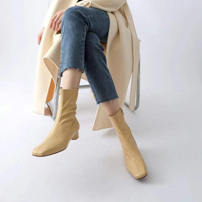 Botas tipo calcetín con punta cuadrada en amarillo, beige, negro y café