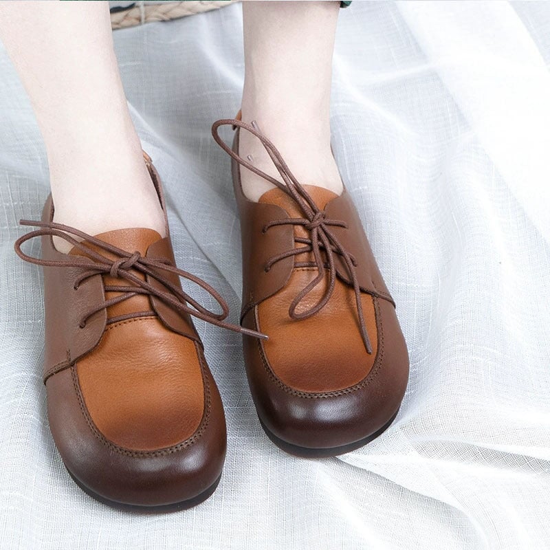 Oxfords planos suaves con cordones