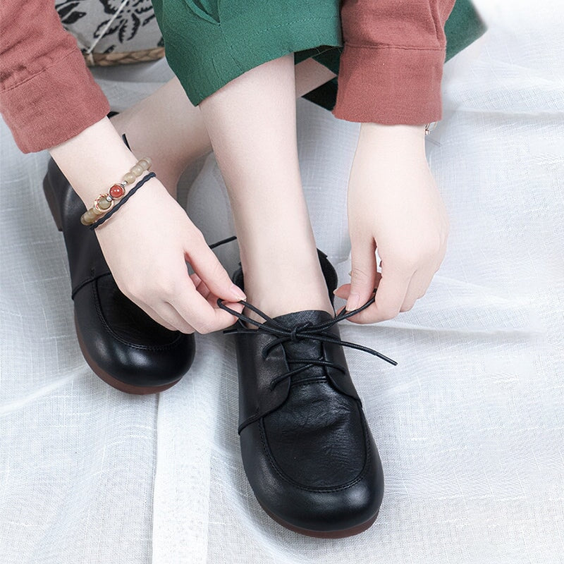 Oxfords planos suaves con cordones