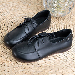 Oxfords planos suaves con cordones